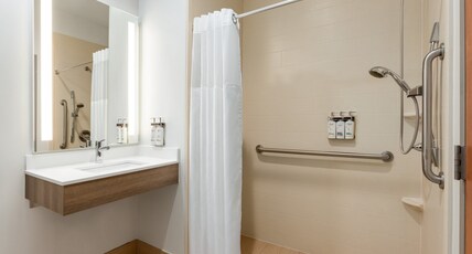 Holiday Inn Express Hotel & Suites Edmond Room Type - 1 King Standard Mobility Accessible Roll In Shower Holiday Inn Express Hotel & Suites Edmond Room Type - 1 King Standard Mobility Accessible Roll In Shower