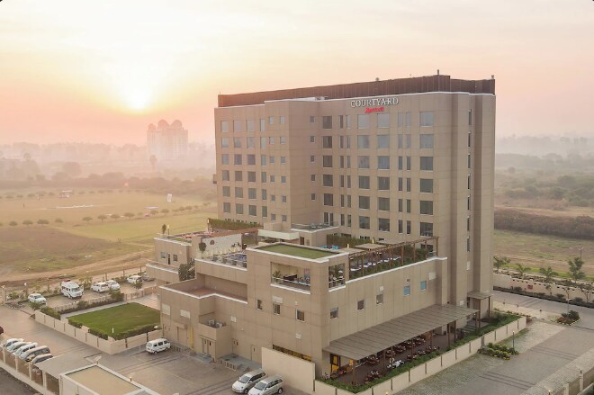 Courtyard Marriott Surat- SMT - Tap to explore photos