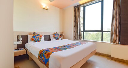 FabHotel Apex Intercontinental = Nr. Pink Square Mall Room Type - Premium Room