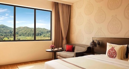 Vivanta Guwahati Room Type - Presidential Suite Hill view King Bed with complimentary one way airport transfers Vivanta Guwahati Room Type - Presidential Suite Hill view King Bed with complimentary one way airport transfers