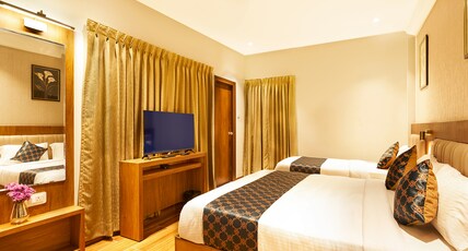 Hotel Liza Royale near Chennai Central Railway Station Room Type - Premium Triple Room