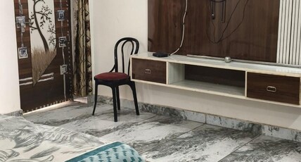 radhika comfort stay Room Type - deluxe double room
