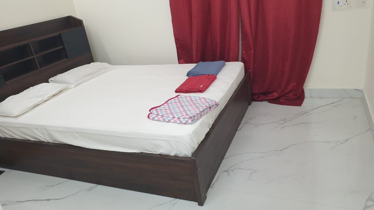 IP service apartment saligramam - Tap to explore photos