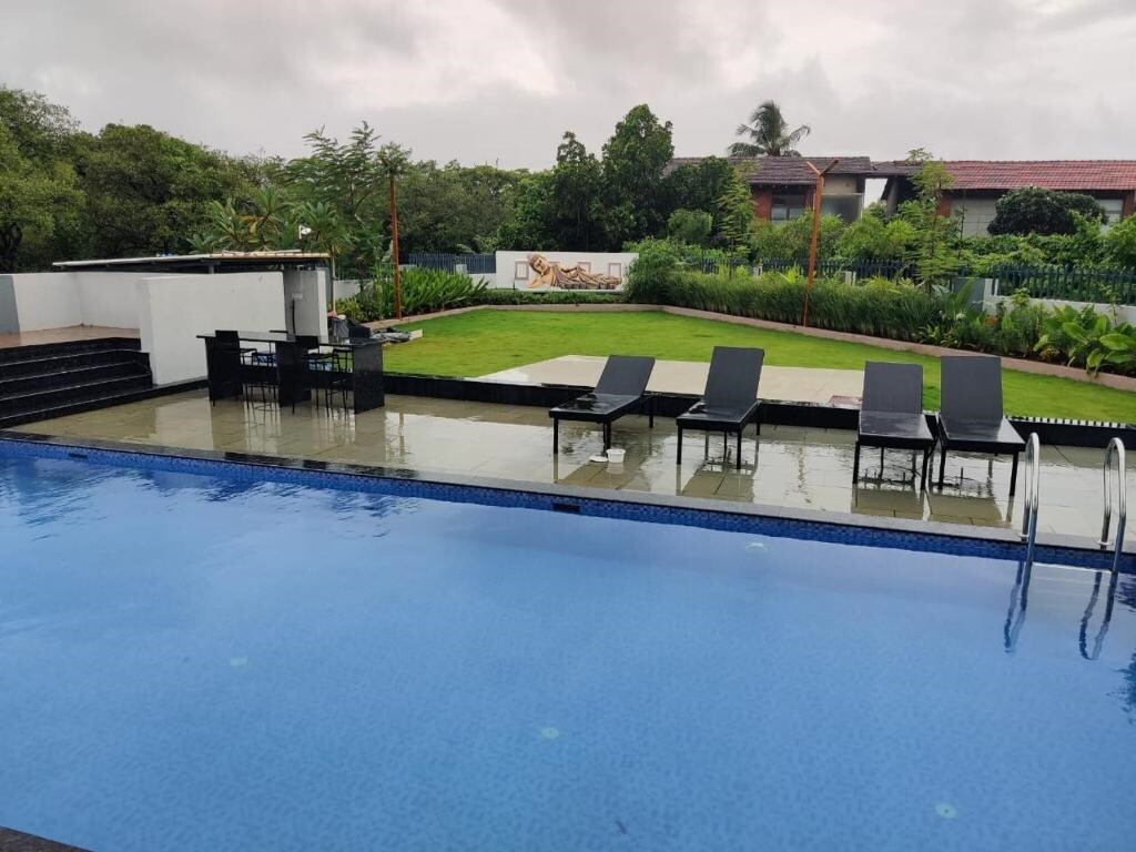 Shubhakanksha 1BHK Candolim - Tap to explore photos