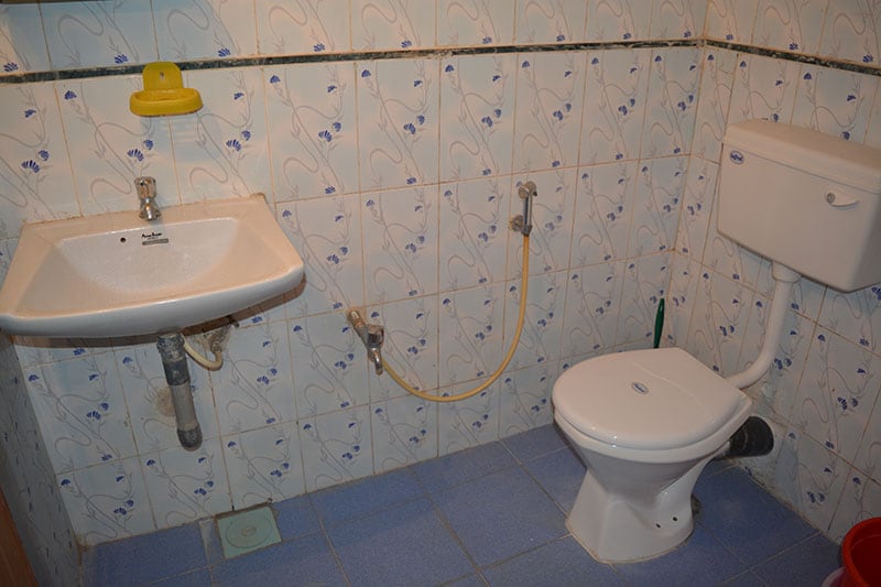 Vailankanni Guesthouse | Rooms & Kitchen - Tap to explore photos