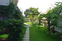 The Red Lotus Premium | Rooms in an Apartment