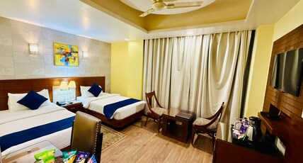 The Red Velvet Hotel Samarpan Room Type - Club Room