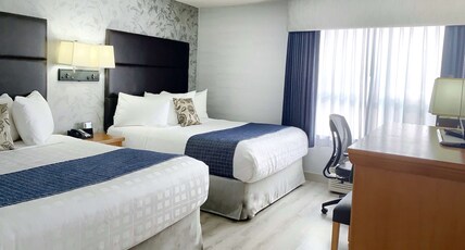 Best Western Plus Regency Inn and Conference Centre Room Type - Suite - 3 Queen Beds, Non-Smoking, Plus Single Sofabed, Family Oversized Room, Microwave And Refrige