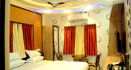 GreenLeaf Regency Room Type - Deluxe Room with Free Wi-fi