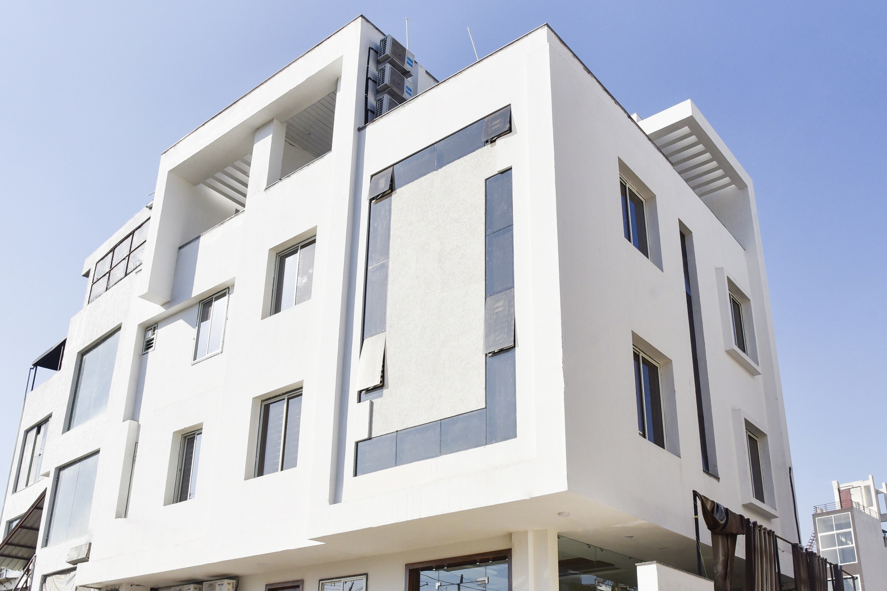 Hotel O K Square - Tap to explore photos