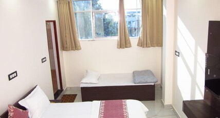 DASHRATH RESIDENCY Room Type - Deluxe Double Room