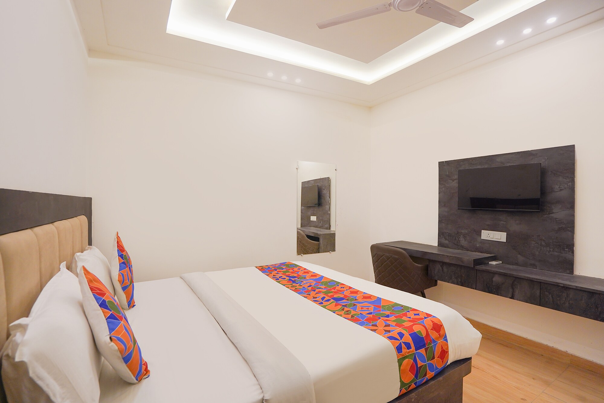 FabHotel Roomers - Tap to explore photos