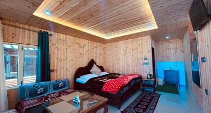 Auli Goldcrest Room Type - Wooden cottage triple bed sharing