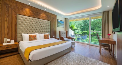 Snow Valley Resorts & Spa (A Centrally Heated Mountain Side Resorts ) Room Type - Garden View Room ( With Balcony and Centralised heating during Winters)