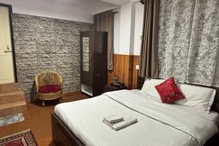 Rooms of Spell Huts & Homestays