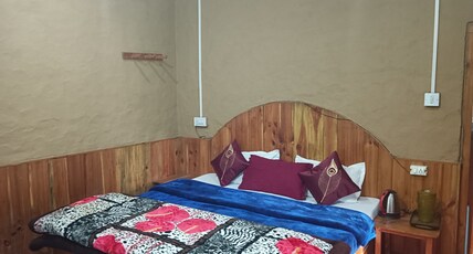 Riverstep Nature Camp & Huts Room Type - DoubleBed Hut- River view with balcony