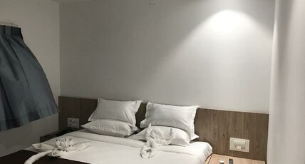 KAVYA RESTRO Room Type - Deluxe Room