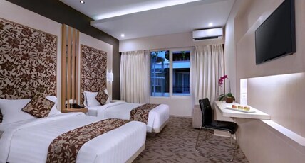 Quest San Hotel Denpasar by ASTON Room Type - Superior Room Pool View