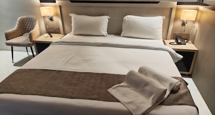 Sky Deckz (A Unit of Q Hexa Multi Venture Pvt. Ltd.) Room Type - Deluxe room with Dhauli Stupa view Sky Deckz (A Unit of Q Hexa Multi Venture Pvt. Ltd.) Room Type - Deluxe room with Dhauli Stupa view