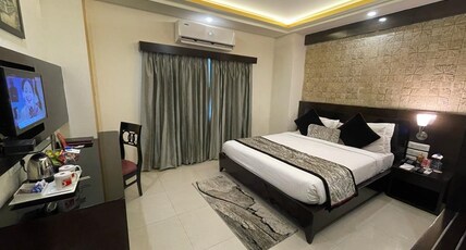 The Vaishnavi Room Type - Deluxe King Room Corporate