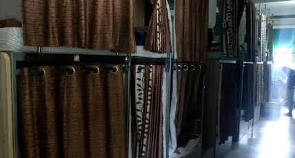 Jay Gurukrupa Dormitory Vadodara Room Type - 1 bed in an 18 bunk bed AC Male Dormitory with shared washroom