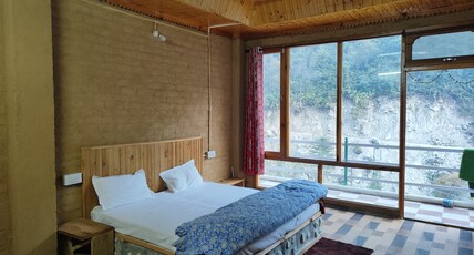 POOJA RIVER VIEW HOME STAY Room Type - DELUXE ROOM