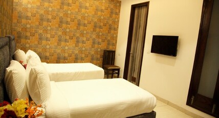 HOTEL RIYASAT Room Type - TWIN SHARING DELUXE ROOM