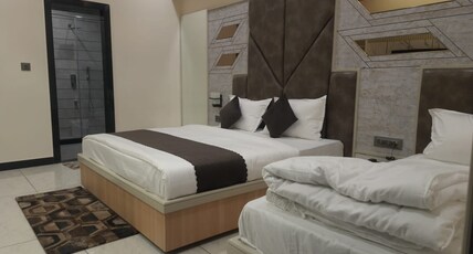 Hotel Jai Palace Room Type - Super Deluxe Triple Bedroom with balcony