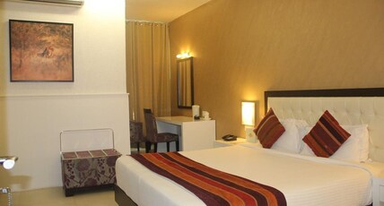 Aarohi Starz Club Room Type - Deluxe Room with Garden View