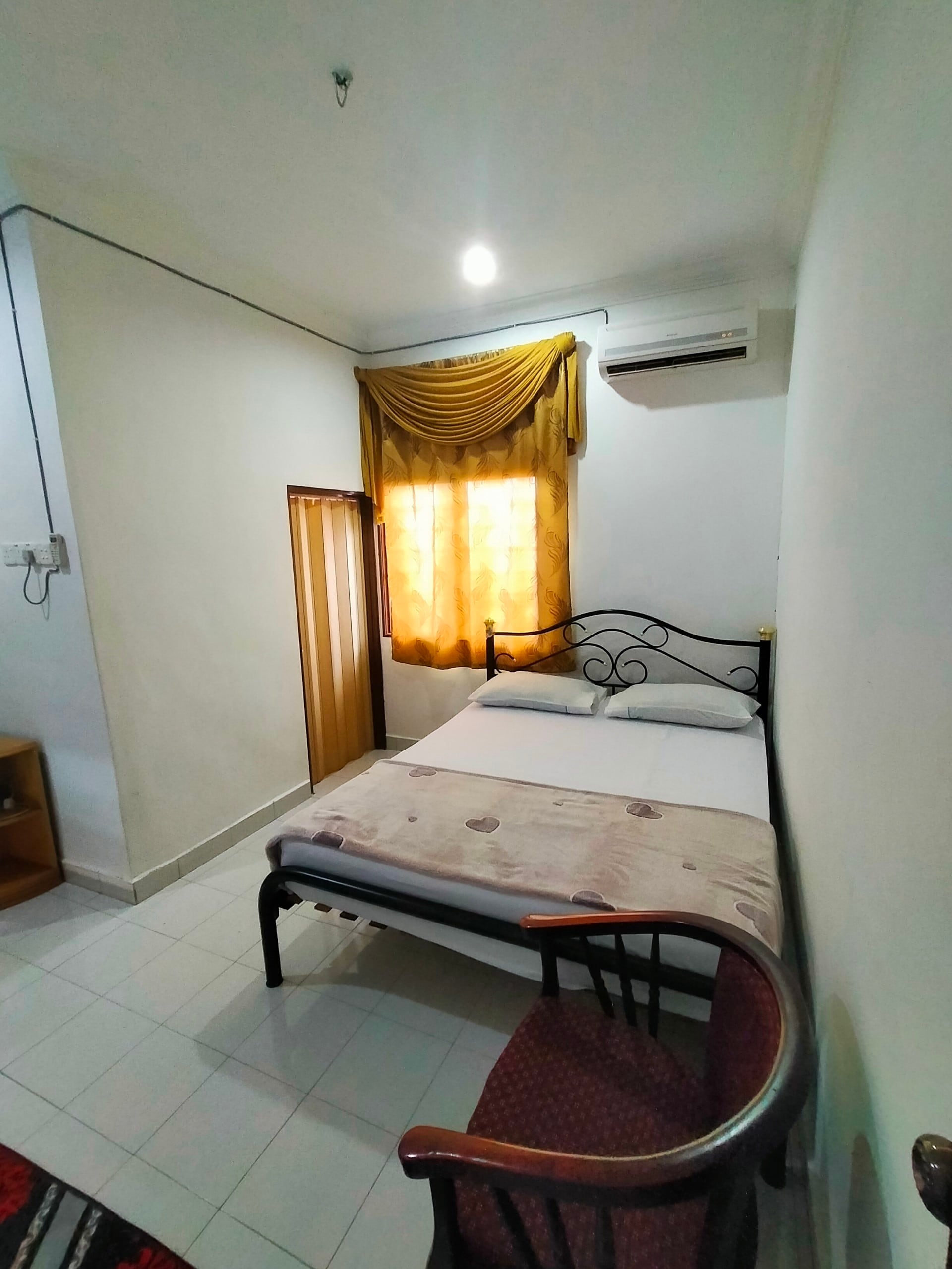 OYO Home 90388 Homestay Masha - Tap to explore photos