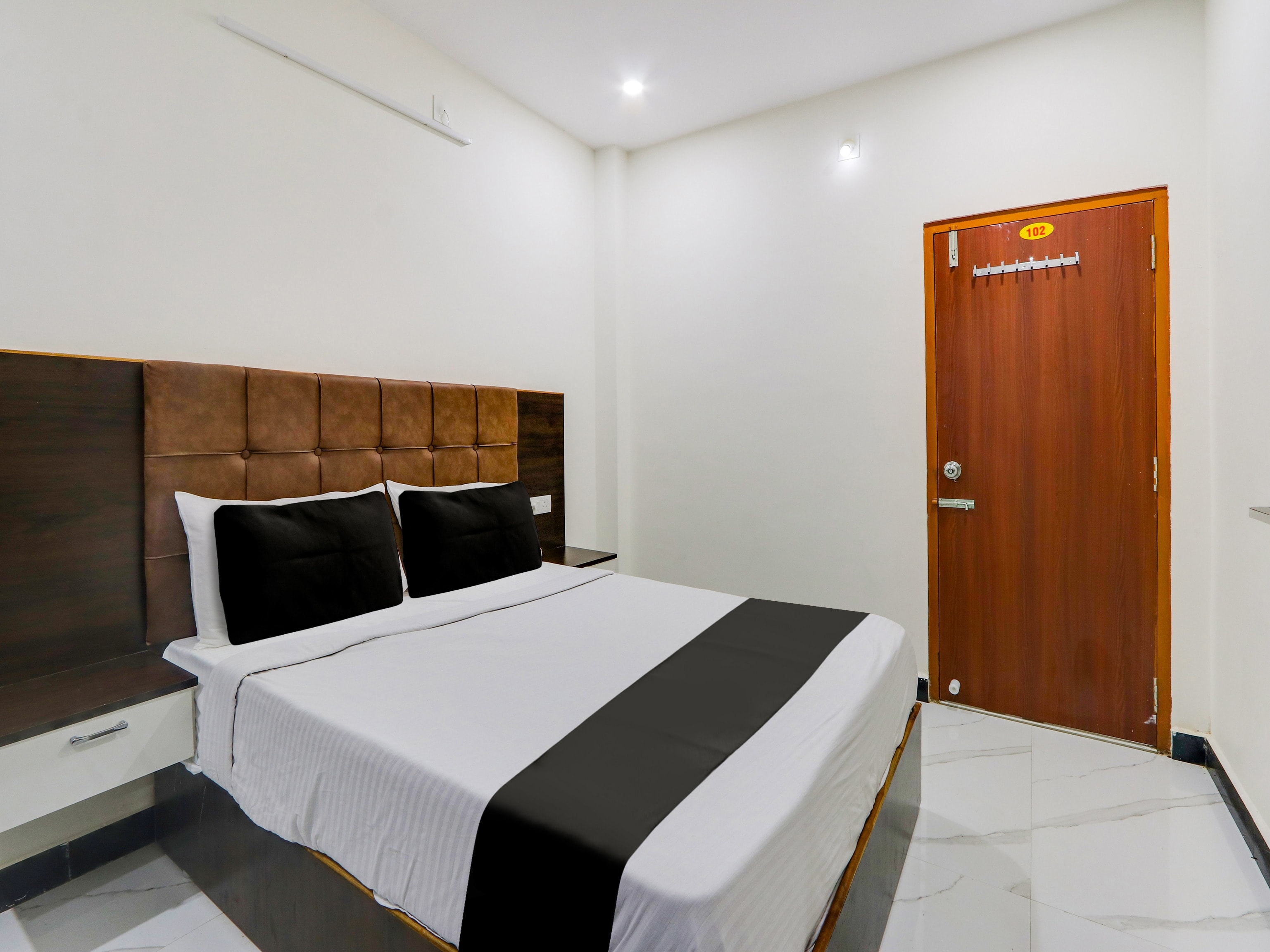 Hotel O Arjun Residency - Tap to explore photos