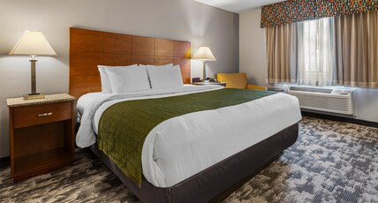 Best Western Ambassador Inn & Suites Room Type - 1 King Bed, Non-Smoking, High Speed Internet Access, Refrigerator, Coffee Maker, Iron And Ironing Bo