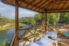 SaffronStays Riverfront Manor