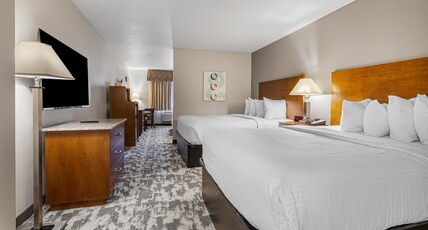 Best Western Ambassador Inn & Suites Room Type - 1 King 2 Queen Beds, Non-Smoking, 2 Flat Screen Tvs, Microwave And Refrigerator, Wi-Fi, Continental 