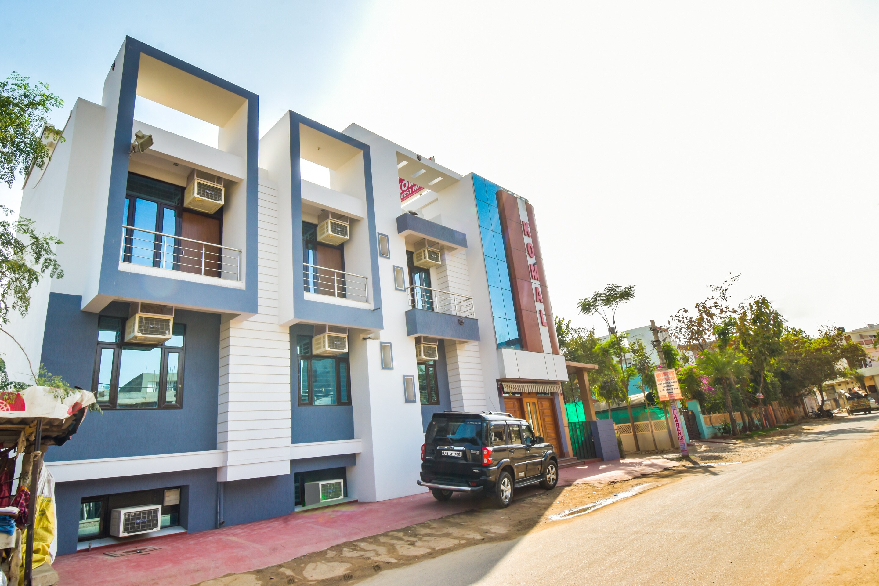 Super Hotel O Komal - Tap to explore photos