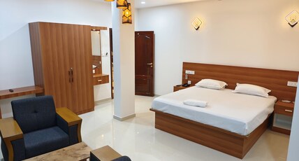 S G Mahal and Rooms Room Type - Deluxe King Room