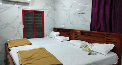 J J RESIDENCY Room Type - Quadruple Room