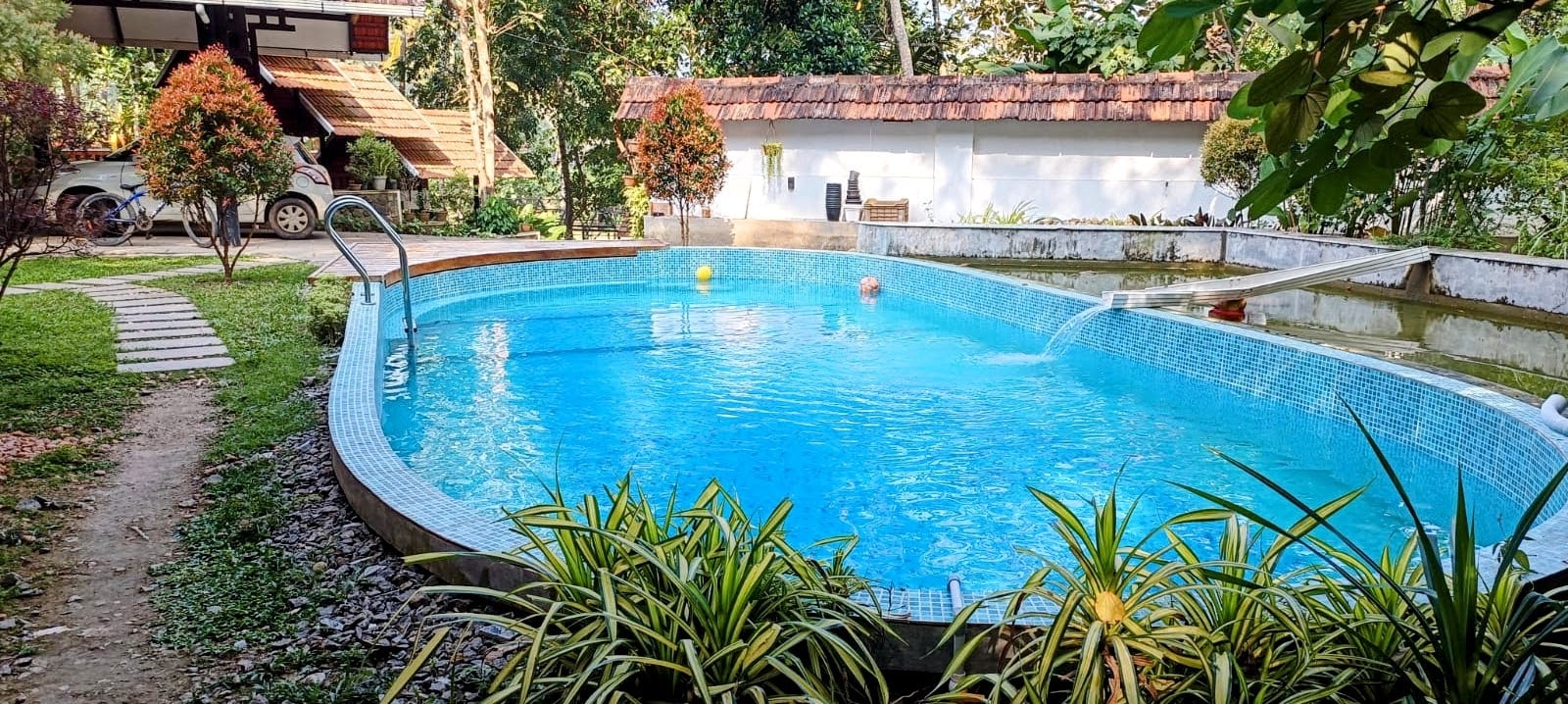 Nellu - Tranquil Pool Villa |Organic Farmstay | Near Varkala - Tap to explore photos