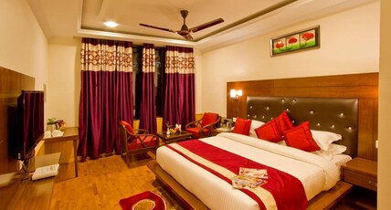 Holiday Heaven -Pure veg Hotel Walking to Mall Road Room Type - Premium Rooms