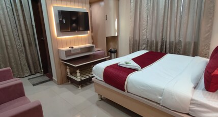 TRPOTELS Sanmat Room Type - Deluxe Room