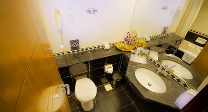 Landmark Summit  Room Type - Deluxe Triple Room