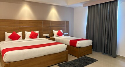 Mangala Temple View Room Type - FAMILY 3 BEDDED DELUXE AC ROOM