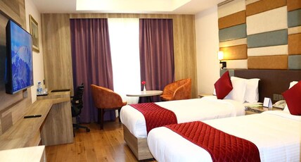 Capital Park Residency Room Type - Deluxe double twin Bed AC