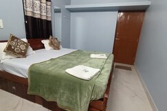 Rooms of Coconut Tree Guest House and Restaurant (Hampi)