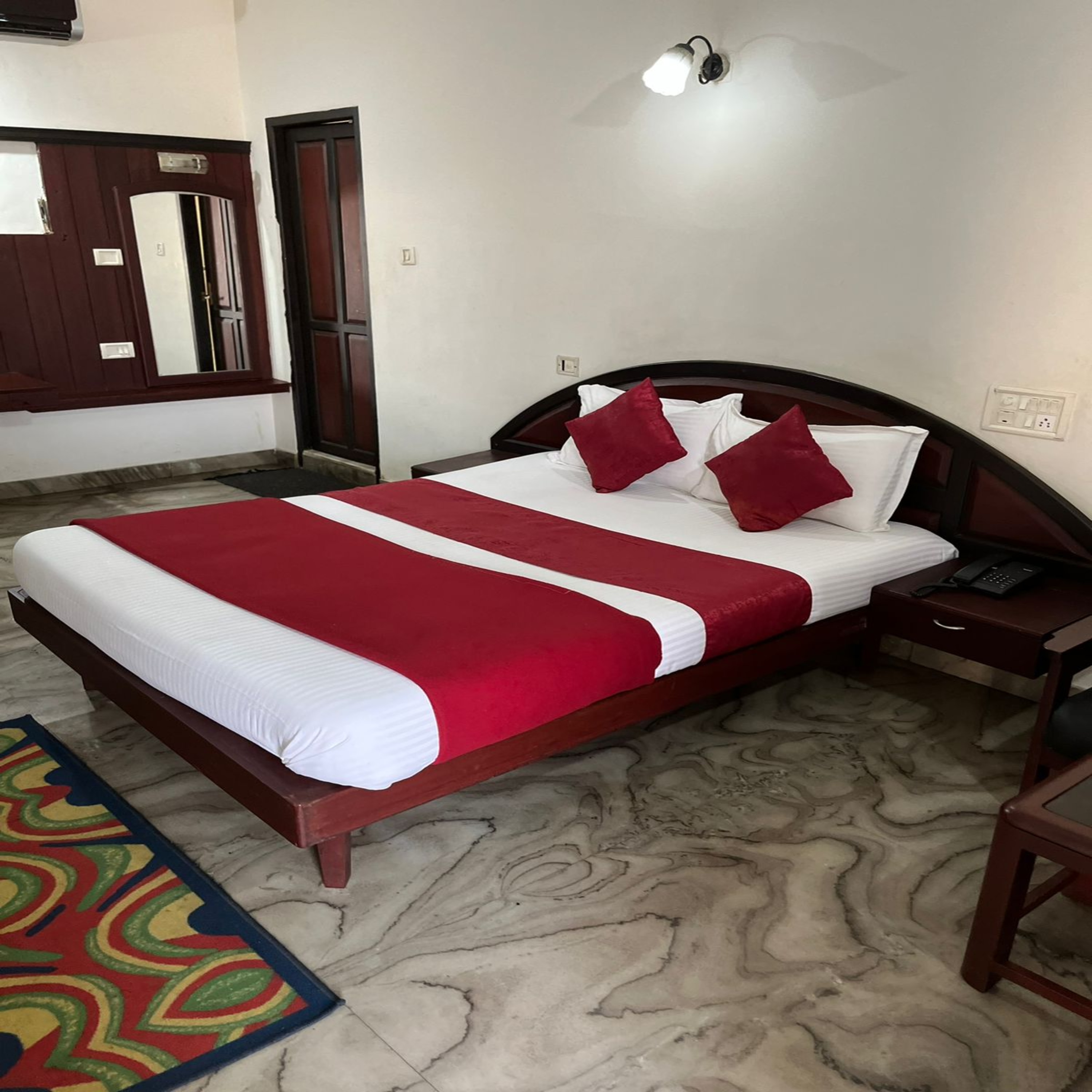 Redbell Suites Manjeri - Tap to explore photos