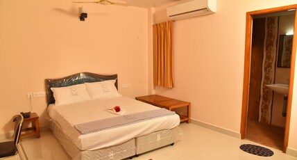 Ananda Residency Room Type - Deluxe Double Room - AC