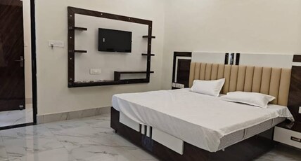 Hotel Dev Shree Dham Room Type - Deluxe AC