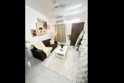 402 Beige Bliss 1BHK Near Airport