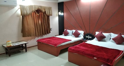 Hotel Meera Dwarka Room Type - 4 Bedded AC Family Room (Price is for 4 adults) Hotel Meera Dwarka Room Type - 4 Bedded AC Family Room (Price is for 4 adults)