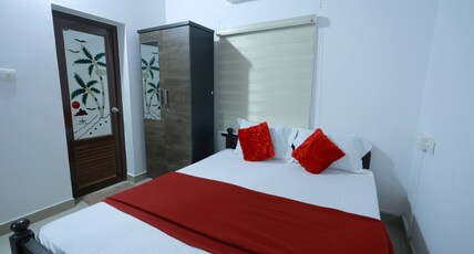 Nirmalyam (Gold homestay) Room Type - AC Family Room 101